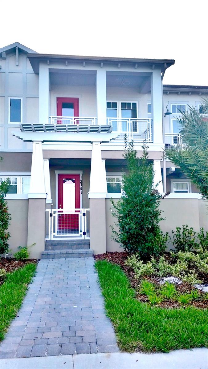 Your Dream Home Awaits. Discover unparalleled convenience and luxury at 13741 Benavente Ave. Nestled in the vibrant Laureate Park community, this stunning property offers a blend of modern comfort and prime location. Enjoy effortless access to nearby shopping centers, major highways, and Orlando International Airport. Take in picturesque waterfront views from your front porch or second-floor patio, overlooking the renowned Medical City. The great room, ideal for entertaining, is seamlessly connected to a gourmet kitchen equipped with stainless steel appliances, an oversized island, and elegant granite countertops. The upstairs master suite features a double vanity, garden tub, separate shower, and spacious walk-in closets, providing a serene retreat. The unit includes a hallway laundry closet and a built-in desk, enhancing functionality and comfort. Experience the best of Laureate Park with access to parks, state-of-the-art community pools, and top-rated schools. Basic cable, internet, and lawn care are included, along with all HOA-provided amenities. The home features a private paved patio and a 2-car garage with alley access, offering both convenience and privacy. This is more than just a house; it's a place to call home. Embrace the lifestyle and community spirit that Laureate Park offers. Welcome to your new home at 13741 Benavente Ave.
