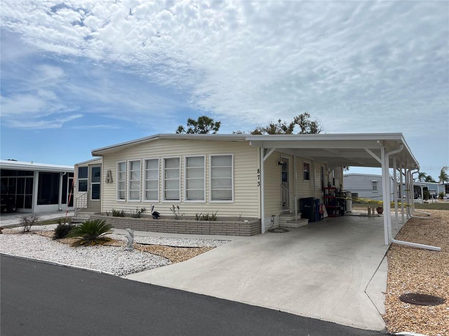 Vinyl siding, flat aluminum roof over, New carport (just needs a shed), some windows have been replaced, Large bay windows in the front let in loads of light, all rock yard with a rear patio under a shade tree give a great morning coffee spot.
Venice Isle is the premier resident owned over 55 Mobile home Park in Venice. There are close to 1000 homes with the most active residents. There is always something going on for you to do. We have many Park gatherings and first rate shows on site. The Park has every amenity you can imagine. Come take a walk through both of our 2 clubhouses and make yourself at home. The Park has 2 tennis courts, a fitness center, 2 heated pools, 2 hot tubs, saunas, putting greens, shuffleboard, Bocce ball, miniature golf, art rooms, pool room, TV lounges, card rooms, library, horseshoes, ceramic kilns, 2 huge ballrooms, Sunday services and much more!