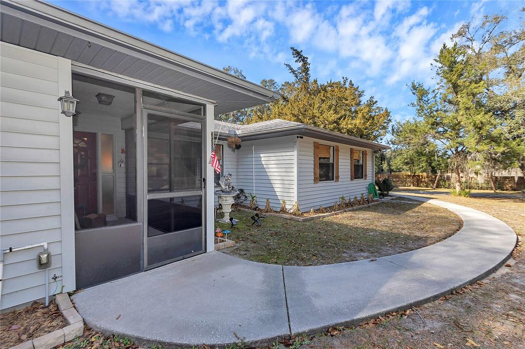 Photo of 3598 SW Trout Street, Dunnellon, FL 34431 (MLS # OM717661)