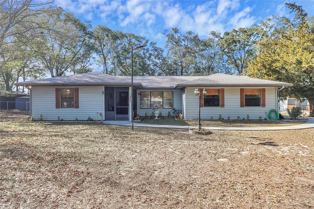 Photo of 3598 SW Trout Street, Dunnellon, FL 34431 (MLS # OM717661)