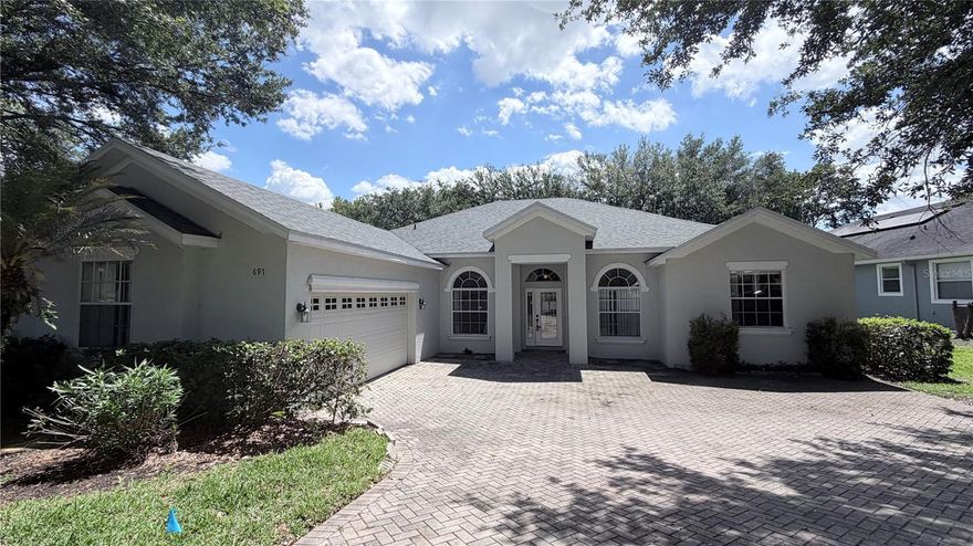 This Errol Estates home in the Parkside subdivision is ready for immediate move-in! This 4 bedroom 3 bath house has everything you would want. It feastures almost 2600 square feet in an open and spacious layout with wood or tile floors throughout, built in nooks for featuring artwork, high ceilings, security system, and plenty of windows for natural lighting, high ceilings, and split bedroom plan. The nicely landscaped yard is maintained by lawn service included with the lease.. Spacious and open layout features both formal living and dining rooms as well as a great room area with casual family room, breakfast nook and adjacent kitchen. Stainless steel appliances in the kitchen include side by side refrgerator with dispensers, glass-top range, built in microwave, and dishwasher. There's plenty of dark wood cabinets with pull out lower shelves, faux-granite countertops and a step in pantry closet. An angled breakfast bar with kitchen sink separates the kitchen from the living area. The screen porch can be accessed by a bank of sliding glass dorrs and one of 3 bathrooms. Primary bedroom suite has large bedroom area and the very spacious bathroom incudes two vanity areas, two walk-in closets, glass walled shower, garden tub and a commode room for privacy. Off a small hallway from the great room there is a bedroom and full bath on the back side of the house. Two more bedrooms and another full bath are off a separate hallway from the great room area. The laundry room with hookups for your own washer and dryer is located off kitchen and leads to garage. This garage has plenty of space for two full sized cars and a side nook where a/c and water heater equipment are located. A large paver driveway area offers plenty of space for cars and leads to a paved service lane that separates the house from Erroll Parkway. Parkside at Errol Estates has its own community pool area with meandering style pool and separate shallow pool, a covered cabana and a playground. There is also a nature trail for walking or bicycles. Errol Estates has grocery restaurants and other retail options nearby and access to SR 429 interchange for commuting is within a few miles. Check Orange County School District website for school assignments: at https://www.ocps.net/
Don't miss out on this one!
