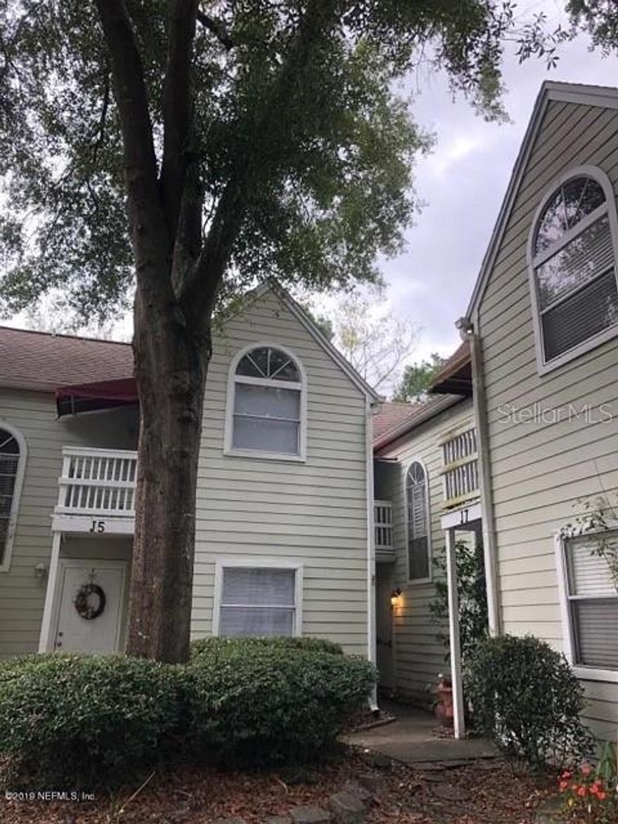 A Slice of Serenity at 2300 Twelve Oaks Dr Unit J-6. Welcome home to this meticulously maintained residence nestled in the sought-after locale of Orange Park, FL. Spanning over 1,100 square feet of finely appointed living space, this 2-bedroom, 1.5-bath haven promises comfort, modern style, and the kind of tranquil living you've been yearning for. As you step inside, you'll immediately notice the harmonious blend of functionality and contemporary design. The recently updated kitchen is an epitome of modern elegance, featuring sleek stainless-steel appliances that are complemented perfectly by chic open shelving units, ready to showcase your finest kitchenware or a curated collection of cookbooks. The living space exudes a warm and inviting ambiance, effortlessly leading you to the cozy back patio where you can enjoy a morning cup of coffee or an evening glass of wine, surrounded by the peaceful whispers of the neighboring greens. Journey upstairs to find two generously sized bedrooms, each boasting private balconies that serve as personal retreats where you can enjoy a breath of fresh air and perhaps a glimpse of a sunrise or a serene sunset. The spacious rooms offer a perfect blend of comfort and style, promising rejuvenating nights of rest. Life at 2300 Twelve Oaks Dr Unit J-6 comes with the added peace of mind of having a HVAC system and water heater that are both just at 5 years old (installed in 2018), ensuring optimal efficiency and reduced maintenance worries. Situated in a prime location, this home puts you within close proximity to a variety of amenities and recreational opportunities that Orange Park has to offer. Here, you're not just buying a home, you're investing in a lifestyle filled with moments of peace, joy, and countless memories in the making. Your dream home awaits at 2300 Twelve Oaks Dr Unit J-6, a place where elegance meets comfort in the heart of Orange Park.