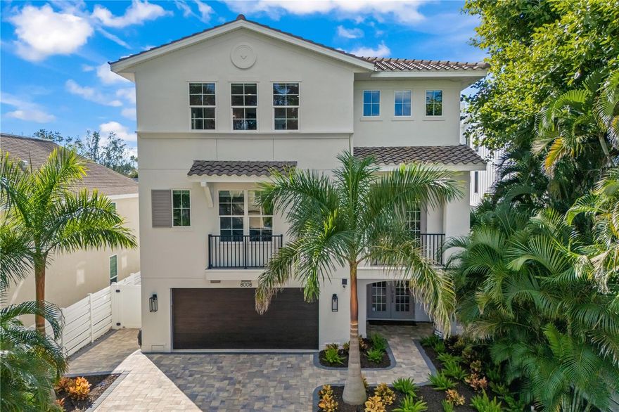Tucked beyond a newly installed private gate and framed by fresh coastal landscaping and a brand-new perimeter wall, 8008 Midnight Pass emerges as a reimagined waterfront sanctuary on Siesta Key. Every approach feels intentional—from the new front pavers illuminated by refined landscape lighting to the home’s fully repainted exterior and updated architectural lighting that casts a soft glow over its modern coastal lines. This 2015-built estate has been elevated with thoughtful enhancements inside and out, creating a residence that feels both timeless and entirely current.

Inside, the transformation continues with all-new flooring, fresh interior paint throughout, new railings on the staircase, and designer lighting placed with exquisite attention to detail. A state-of-the-art Sonos surround system fills every space with immersive sound, while added smart-home features—including Brilliant switches and Philips Hue lighting—allow you to curate ambiance with ease. An updated alarm system and new garage door opener add security and convenience, while spray-foam insulation in the attic ensures efficient, year-round comfort.

The heart of the home—the kitchen—has been completely re-envisioned. Now a showpiece, it features Viking appliances, custom cabinetry with under-cabinet lighting, a bespoke hood, quartzite countertops and backsplash, a dedicated bar area, and even a Viking ice maker. This culinary space flows effortlessly into the open living area, where expansive glass sliders still frame the shimmering waters of Heron Lagoon. In the nearby den, a custom Murphy bed adds flexibility for guests, while the laundry room is being finished with built-in cabinetry that elevates both function and style.

Upstairs, the guest bedrooms now feature elegant wainscoting paired with designer wallpaper, creating spaces that feel warm and thoughtfully curated. One guest bathroom has been fully remodeled, while all bathrooms throughout the home have been refreshed with upgraded lighting and new sink and shower fixtures.

Beyond the walls, the outdoor experience has been elevated to resort standards. A brand-new lanai screen wraps the upper balcony, perfect for morning coffee or candlelit evenings overlooking the lagoon. The tropical pool area has been revitalized with new pool equipment and LED lighting, enhancing both performance and nighttime ambiance. A convenient kayak and paddleboard launch invites you to explore the tranquil waters just steps from your backyard. The IPE dock remains a serene vantage point for sunset reflections, while the lush grounds now include a private basketball court—a rare lifestyle amenity on Siesta Key.

Additional touches, such as a new illuminated mailbox, complete the home’s polished presentation.

Epitomizing serenity, sophistication, and the ease of coastal living, 8008 Midnight Pass offers the luxury of a brand-new feel within an already exceptional waterfront setting. Here, every detail has been refined, every space reimagined—creating a modern retreat where beauty, comfort, and nature come together in perfect harmony. Don't miss your chance to make this magnificent home your own! Schedule your showing today!