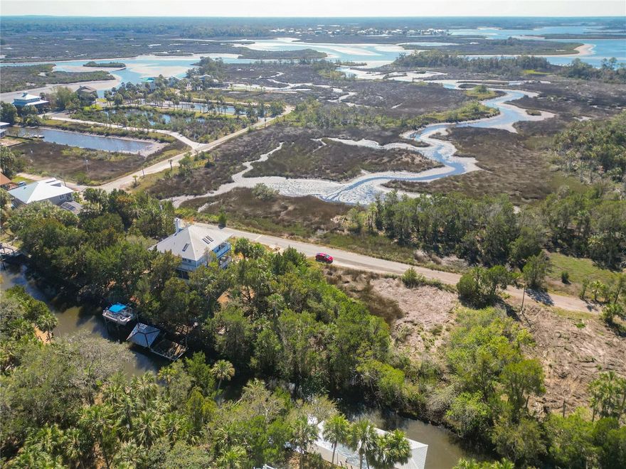 This stunning waterfront homesite offers 70 feet of waterfront frontage on a canal with no bridges to the Gulf of Mexico. This property provides endless possibilities to build your dream home in a prime location. Enjoy easy access to world-class fishing, scalloping, and boating. The lot is surrounded by mature trees and abundant wildlife, including manatees and dolphins. Just a short boat ride to Three Sisters Springs, Hunter Springs, and downtown Crystal River, where you can enjoy local festivals, waterfront dining, and shopping. Don't miss this chance to own a piece of paradise! Call today for more details.