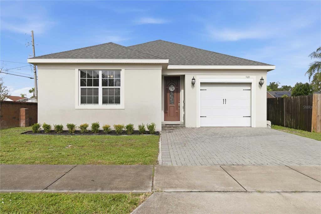 Photo of 508 Hibiscus Cove Drive, Orlando, FL 32807 (MLS # O6432326)
