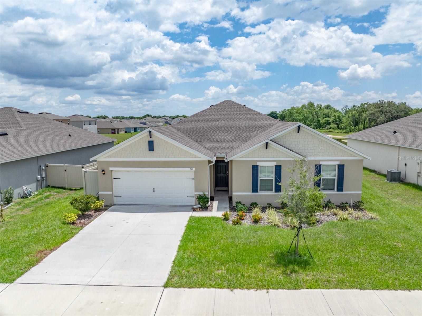 Spectacular 4-bedroom home with an abundance of living space and no rear neighbor. 70’ wide lot with nice back view and privacy. DRHorton Cairn model on the water. The back yard has water and conservation views. Auburn Grove is a quiet, desirable community to live in – great neighbors! Excellent location with easy access to Tampa, Orlando, attractions and several surrounding lakes and public boat ramps. Spacious open floor plan with large kitchen island that opens to the dining area and to the family room. From the kitchen and from the dining area and from the family room one can look out back through one of four large windows or through the double-sliding door to enjoy the water & conservation views. Double sliding doors open to the back porch. It is a very large backyard that is partially fenced! Large screened back porch. This home is light and bright! Cabinets, counter tops, walls, and colors are all very appealing. Several closets, including some walk-in closets, throughout the home allowing for plenty of storage. Large inside laundry room. Newer appliances include refrigerator, range, microwave, washer, and dryer. Garage door opener with remotes and app for phone use, and it has an outside entry keypad. 4 bedrooms - yes, there are four good-sized bedrooms. 2 full bathrooms. The owner has added towel bars and racks in both bathrooms. The owner has also added matching hardware to all cabinets and all drawers in the kitchen and in both bathrooms. There are gutters on the front of the home at the entrance. This home is gorgeous! Covered back porch facing east - so you will love sitting out back on the porch in the afternoons and evenings. The windows from the primary bedroom also face out back to view the water and the conservation area. The rent includes access to the amenity center with pool. Smart House with Safe Touch is available. Almost 2700 total square feet. Lot is 70' wide and 136' deep. No smoking. Small dog or two small dogs will be considered or perhaps one small-medium dog, which must be well trained. Only 1 mile from the new Publix center! Only about 3 miles from I-4 or downtown Auburndale or the Amazon Fulfillment Shipping Center. Fantastic relaxing privacy with no back neighbors and a one-story home on each side. Home is immediately available to be leased. Renter will be responsible for yard care - this includes grass cutting, edging, yard treatment and lawn care. The owner has a service doing the yard work which the renter can continue using if they want to. There is one company taking care of the yard including cutting the grass, trimming, edging and the bushes. There is a second company doing the yard treatment every other month. The home is very clean and ready for a new renter. The owner pays HOA fee and pays for regular AC service fee including providing AC filters. Spectrum high speed internet is available. Renter pays for utilities: power, water/sewer, and internet. Call today for an appointment!