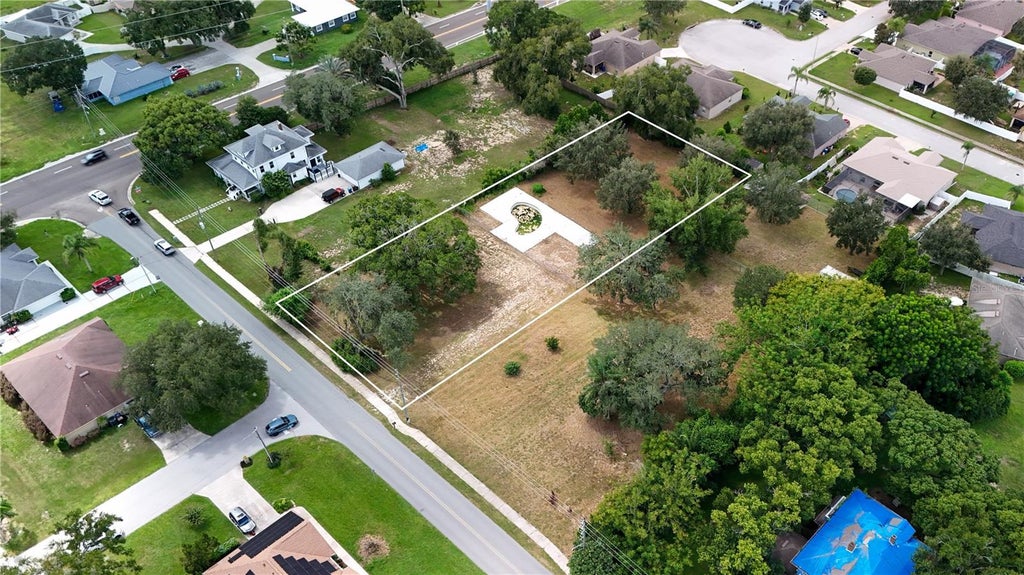 Photo of 2104 Peninsular Drive, Haines City, FL 33844 (MLS # L4965528)