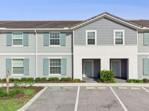 Photo of 7163 Oakmoss Loop, Davenport, FL 33837 (MLS # O6370415)
