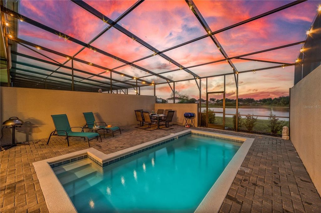 Photo of 7163 Oakmoss Loop, Davenport, FL 33837 (MLS # O6370415)