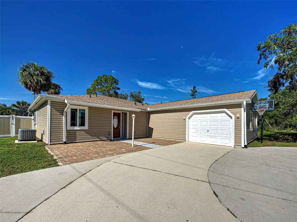 Photo of 21093 Keeler Avenue, Port Charlotte, FL 33954 (MLS # A4669323)