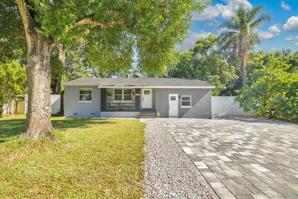 **JUST REDUCED $30,000!!** Close to Downtown Orlando and Orlando’s famous attractions such as Universal Studios, Seaworld and Disney Parks sits this Adorable Airbnb home with no HOA or CDD or restrictions for rent. This 1 Master Bedroom with its own entrance that can be used as an In Law Suite or just rent it out for additional income, has an additional 1 Bathroom, and 1 Flex room that can be used as an office or a spare bedroom for your guests. All bedrooms have ceiling fans, large closets, The bathrooms have everything remodeled brand new with a fresh modern look. Beautiful Luxury Vinyl flooring throughout the entire house. New kitchen cabinets, granite top, newer 2019 a/c units with newer duct work. Inside laundry with washer and dryer hook up. Tankless water heater for constant hot water, full kitchen with Stainless appliances. This property is currently being used as an Airbnb with high income potential or use it as your own home. The back yard is a dream, totally surrounded with a large fenced for privacy, with Mango, Avocado, Banana and Papaya and plantain, dragon fruit to name a few. A large and mature oak tree with huge branches creates a spectacular view that can host a large family gathering. The house has been updated from inside through the outside. Other features include a large outdoor deck with a firepit for night relaxation, a glass of wine or cup of coffee to enjoy conversations with friends and family or a loved one. Spacious laundry room, minutes to Downtown, Orlando International Airport, Florida Mall, Millenia mall, Universal Themed Parks, SeaWorld Parks and Disney Parks within a short drive.