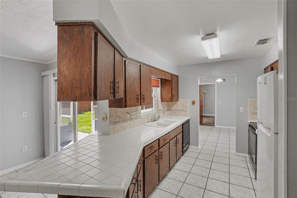 Photo of 5385 Wendy Lee Drive, Titusville, FL 32780 (MLS # O6390212)