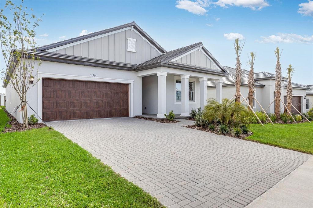 Photo of 31764 Griffin Sands Lane, San Antonio, FL 33576 (MLS # TB8368673)