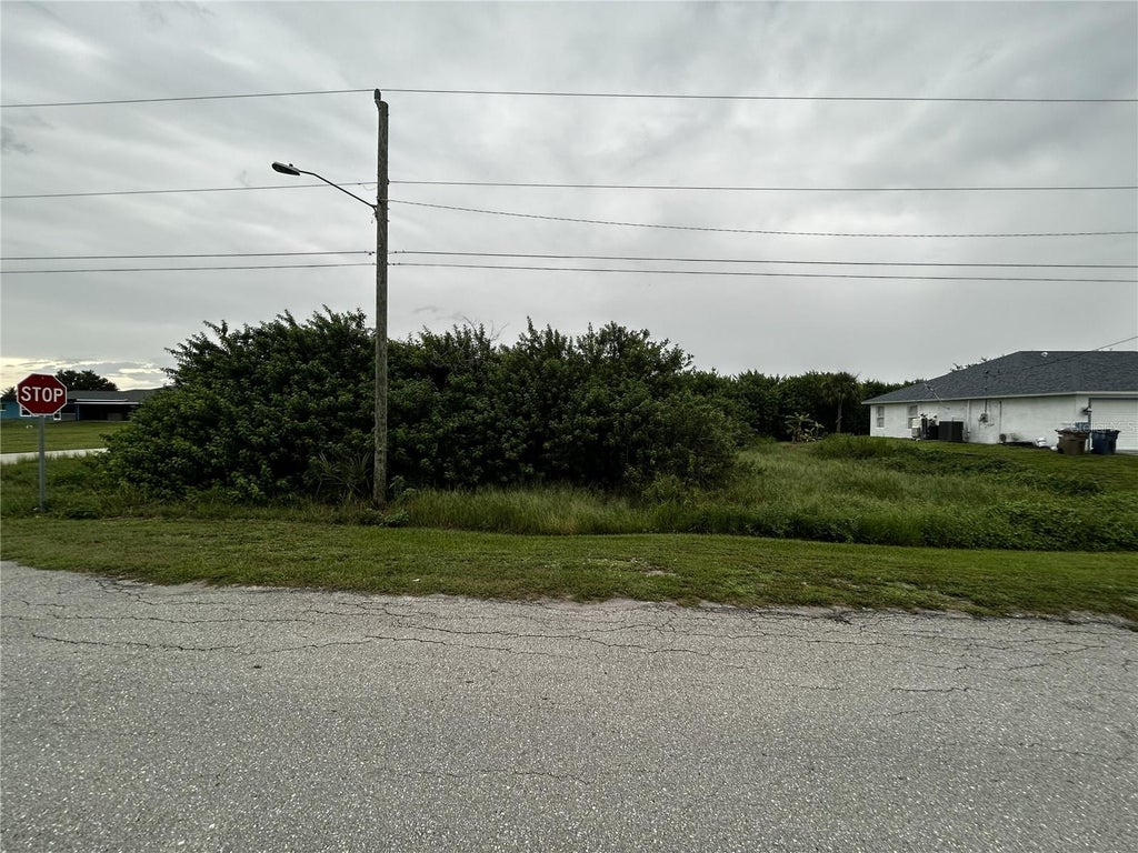 Photo of 165 Pembroke Street, Lehigh Acres, FL 33974 (MLS # A4709126)
