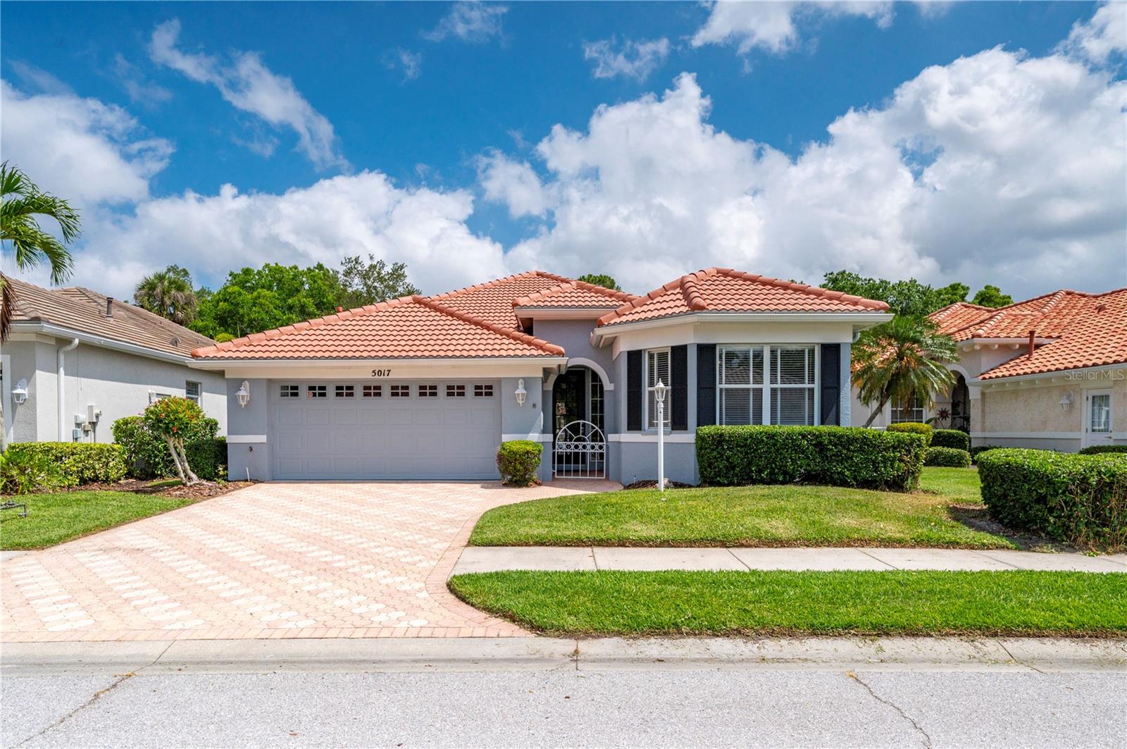 Sarasota’s Palmer Ranch was created years ago as a kind of sanctuary where residents could live, work, shop and play in harmony with nature. Over time it has grown to over 30 private communities that blend a host of lifestyle amenities while maintaining its environmental sensitivity. Turtle Rock is one of these very unique communities, and within the gates of this pristinely maintained community is Savannah, a private enclave that welcomes you with a warm embrace. As you drive the tree lined winding roads you will arrive at this meticulously maintained 3 bedroom, 2.5 bath, study/4th bedroom, with private pool, that masterfully blends subtle architectural details with the most sought after features found in today’s homes. Upon entry you are captivated with the open spaciousness of the home that is enhanced with ceilings soaring to almost 10 ft. in height. The epitome of the perfect entertaining home your guests will be captivated by this overall floorplan that transitions from the ambient warmth of the living room area with its bamboo wood flooring to the open concept of a family room with porcelain tile that expands the kitchen and dining areas, while capturing natural foliage backyard vistas and the pristine waters of your own private pool. The kitchen with its rich honey color wood cabinetry offers an abundance of storage space and is complimented with new granite counters featuring a leather finish than enhances the stones natural beauty. Graphite color appliances that include a natural gas range, compliment the endless amounts of counter space, perfect for displaying your favorite culinary dishes. Your visiting guests will enjoy the peaceful ambiance each bedroom suite has to offer, and for those in need of a home office or crafting room, the fourth bedroom with double French doors and built in storage cabinetry provides that multi-functional capability. The primary bedroom with en suite bath and relaxing garden tub captures both pool and backyard vistas and offers a perfect way to unwind in peaceful solitude at the end of a fun-filled day. One of the signature features of the home is the renovated private pool and lanai area that features exquisite marble tile that flows throughout and enhances the breathtaking view of the teal blue pool waters and the palette of floral fauna beyond. You couldn’t ask for a better way to enjoy poolside barbeques with friends or a romantic evening dinner under a starlit sky and soft ambient lighting. In addition to these refinements additional features and upgrades include, natural gas for the pool heater and Noritz insta-hot water system, new roof (2023), HVAC (2022), pool resurfaced with a beautiful PebbleTec finish, and marble tile installed on the lanai (2023), pool screen (2019) and more. Plus, no hurricane or flood damage from past storms. Take a walk or short bike ride to the lakefront community club house that hosts an array community and private events, or enjoy the cool waters of the large community pool. Other amenities include tennis and basketball courts, a children’s playground and a tree canopied walk-way and bridge that takes you to miles of pristine beauty the famed Legacy Trail has to offer. Within close proximity to a host of the area’s finest restaurants, shopping and the unparalleled gulf beaches, you couldn’t ask for a better place to call home and to enjoy the lifestyle Florida one day you envisioned yourself living.