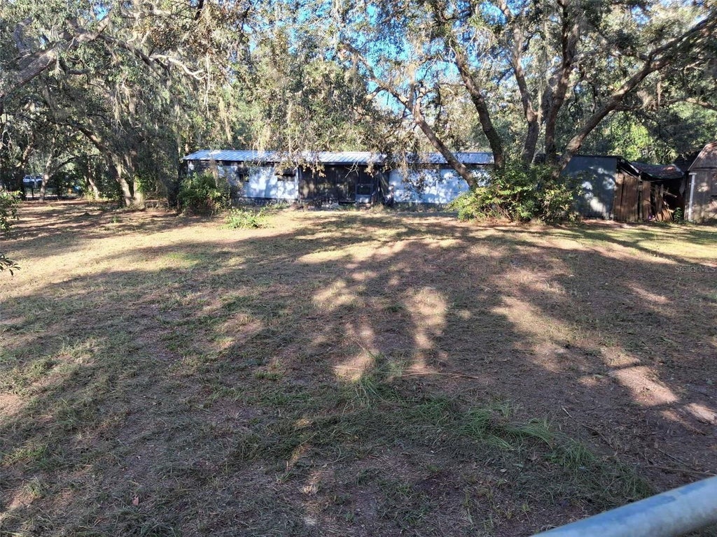 Photo of 3468 Jodi West Drive, Dade City, FL 33523 (MLS # TB8554090)