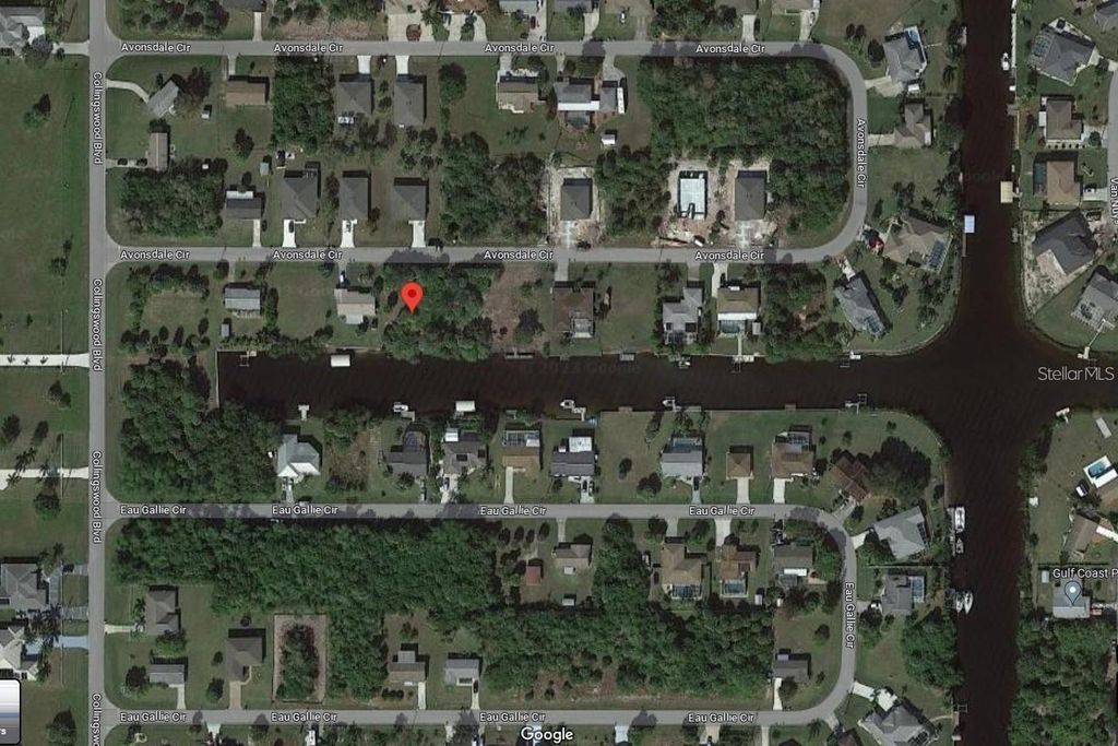 Photo of 18210 Avonsdale Circle, Port Charlotte, FL 33948 (MLS # O6396183)