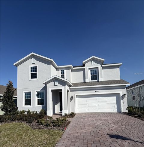 Photo of 6984 Broad Wing Loop, Howey In The Hills, FL 34737 (MLS # O6377528)