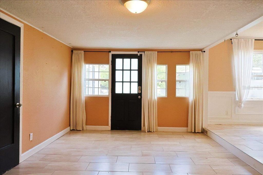 Photo of 731 W Voorhis Avenue, Deland, FL 32720 (MLS # O6355133)