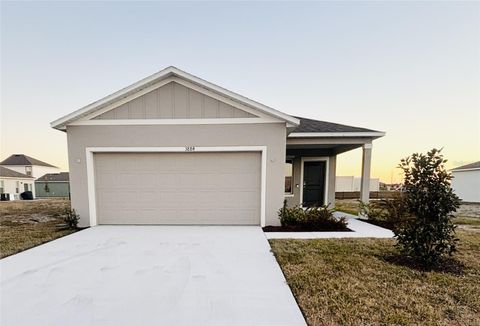 Photo of 3884 Bluethread Way, Poinciana, FL 34759 (MLS # O6303963)