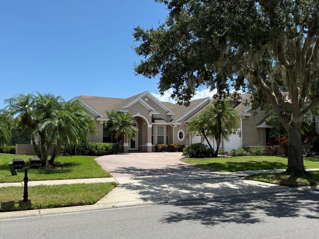 Rarely used 5 Bed/4 Bath POOL Home in GATED Community with GOLF Course frontage and East LAKE Toho Access.  This has been a vacation home for the past 20 years.  This OPEN SPLIT-PLAN home offers formal living and dining rooms as well as a kitchen/dinette - family room combo.  MASTER BEDROOM is large with two closets and SITTING AREA with FRENCH DOORS opening to SCREEN ENCLOSED POOL and Relaxing View as there are NO REAR NEIGHBORS.  GRANITE countertops in kitchen and all bathrooms.  SOARING CEILINGS pretty much throughout the home with TRAY CEILINGS in the Master Bedroom, Living & Dining Rooms.  Master Bath includes JACUZZI/WHIRLPOOL TUB along with separate SHOWER STALL and two SEPARATE VANITIES. All bedrooms are a nice size with two sharing a JACK N JILL BATH.  Kissimmee Bay offers a private boat dock, skiing lake on East Lake Toho, tennis, playground, park & RV storage on site.  Both Water Heaters were replaced in '22.  A/C's were replaced in '12 main house area & '14 bonus room.