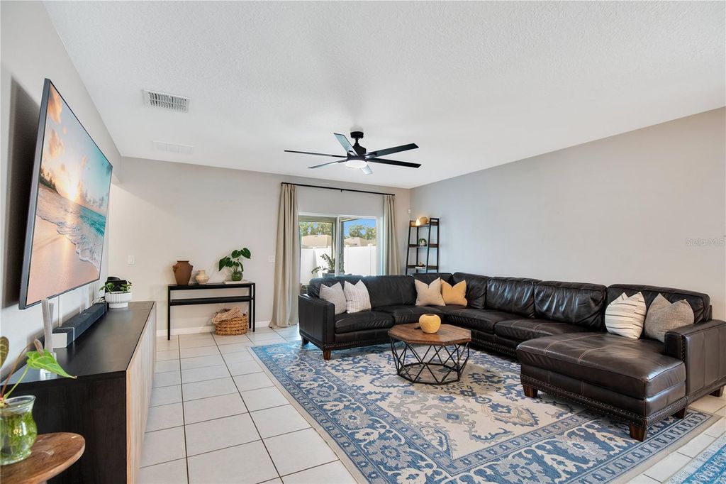 Photo of 186 E Fiesta Key Loop, Deland, FL 32720 (MLS # O6343129)