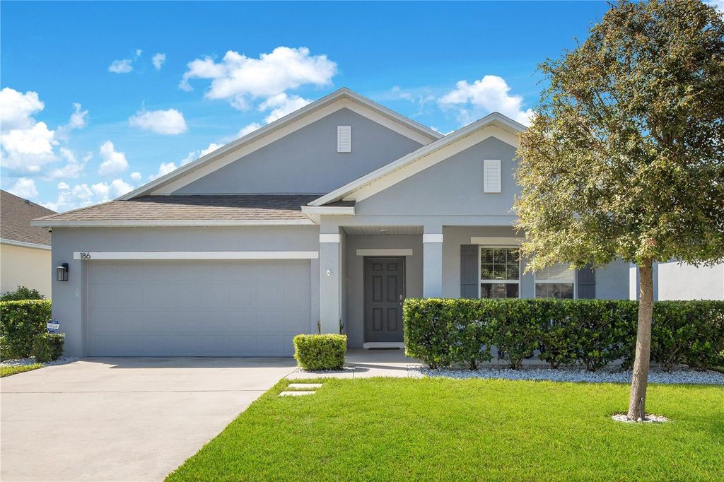 Photo of 186 E Fiesta Key Loop, Deland, FL 32720 (MLS # O6343129)