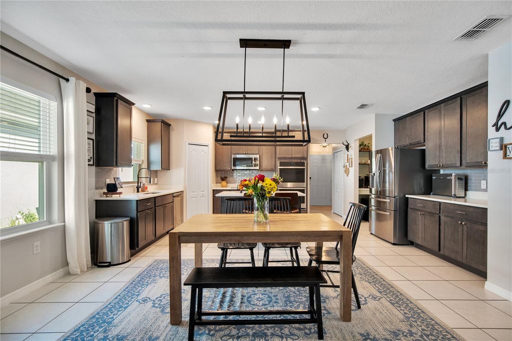 Photo of 186 E Fiesta Key Loop, Deland, FL 32720 (MLS # O6343129)