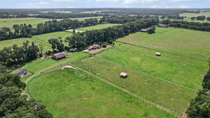 19.17 Acres – Two Homes, Barn, No HOA!
Looking for space, income potential, and a prime location? This beautiful 19.17-acre farm in Romeo checks all the boxes! Situated on a paved road with no HOA, the property is equidistant (22 minutes) between HITS and the World Equestrian Center (see maps in photos) and just minutes from Rainbow Springs.
Perfectly designed for efficiency by a professional horseman, this farm is suitable for any discipline and offers multiple income opportunities. Live in one home and rent out the other (Airbnb/VRBO) for great returns—or even consider adding an RV hookup for guests.
The land was formerly a hay farm, providing established Bahia grass pastures to keep horses in top condition.
 Property Highlights:
Two Homes:
• Main Home – 3BR/2BA block home (1997) with new roof (2024) and HVAC (2022)
• Second Home – 3BR/2BA mobile home (2015)  1080 Sq ft
12-Stall Barn with efficient layout
No HOA & agricultural zoning

Income-producing potential: boarding, Airbnb/VRBO, or seasonal rentals
Roof on Main House is 2024, HVAC 2022

Established pastureland for horses or livestock

Some photos and video are from three years ago (property was off the market due to health reasons). 

This is a rare chance to own a versatile, income-generating farm in a sought-after location.