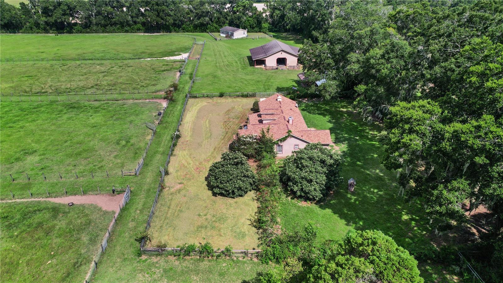 19.17 Acres – Two Homes, Barn, No HOA!
Looking for space, income potential, and a prime location? This beautiful 19.17-acre farm in Romeo checks all the boxes! Situated on a paved road with no HOA, the property is equidistant (22 minutes) between HITS and the World Equestrian Center (see maps in photos) and just minutes from Rainbow Springs.
Perfectly designed for efficiency by a professional horseman, this farm is suitable for any discipline and offers multiple income opportunities. Live in one home and rent out the other (Airbnb/VRBO) for great returns—or even consider adding an RV hookup for guests.
The land was formerly a hay farm, providing established Bahia grass pastures to keep horses in top condition.
? Property Highlights:
Two Homes:
• Main Home – 3BR/2BA block home (1997) with new roof (2024) and HVAC (2022)
• Second Home – 3BR/2BA mobile home (2015)
12-Stall Barn with efficient layout
No HOA & agricultural zoning
Income-producing potential: boarding, Airbnb/VRBO, or seasonal rentals
Roof on Main House is 2024, HVAC 2022
Established pastureland for horses or livestock
Some photos and video are from three years ago (property was off the market due to health reasons), but updated pictures are coming soon—though the farm has changed very little.
This is a rare chance to own a versatile, income-generating farm in a sought-after location.