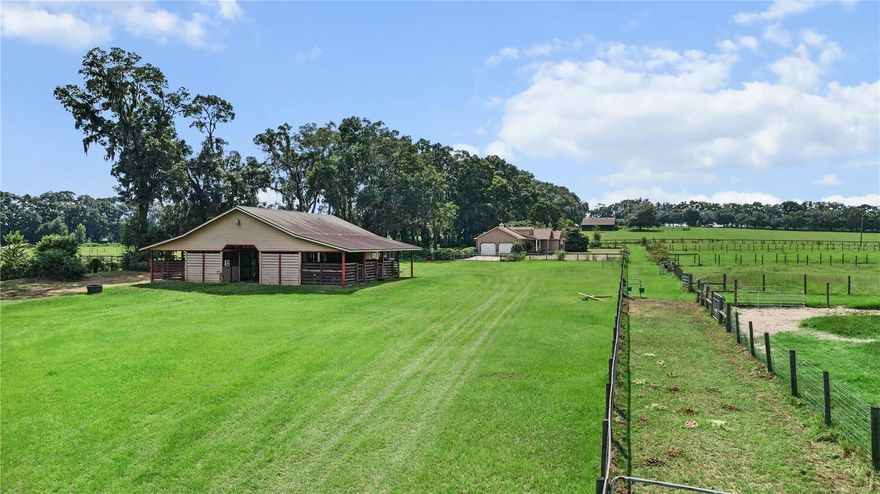 19.17 Acres – Two Homes, Barn, No HOA!
Looking for space, income potential, and a prime location? This beautiful 19.17-acre farm in Romeo checks all the boxes! Situated on a paved road with no HOA, the property is equidistant (22 minutes) between HITS and the World Equestrian Center (see maps in photos) and just minutes from Rainbow Springs.
Perfectly designed for efficiency by a professional horseman, this farm is suitable for any discipline and offers multiple income opportunities. Live in one home and rent out the other (Airbnb/VRBO) for great returns—or even consider adding an RV hookup for guests.
The land was formerly a hay farm, providing established Bahia grass pastures to keep horses in top condition.
 Property Highlights:
Two Homes:
• Main Home – 3BR/2BA block home (1997) with new roof (2024) and HVAC (2022)
• Second Home – 3BR/2BA mobile home (2015)  1080 Sq ft
12-Stall Barn with efficient layout
No HOA & agricultural zoning

Income-producing potential: boarding, Airbnb/VRBO, or seasonal rentals
Roof on Main House is 2024, HVAC 2022

Established pastureland for horses or livestock

Some photos and video are from three years ago (property was off the market due to health reasons). 

This is a rare chance to own a versatile, income-generating farm in a sought-after location.