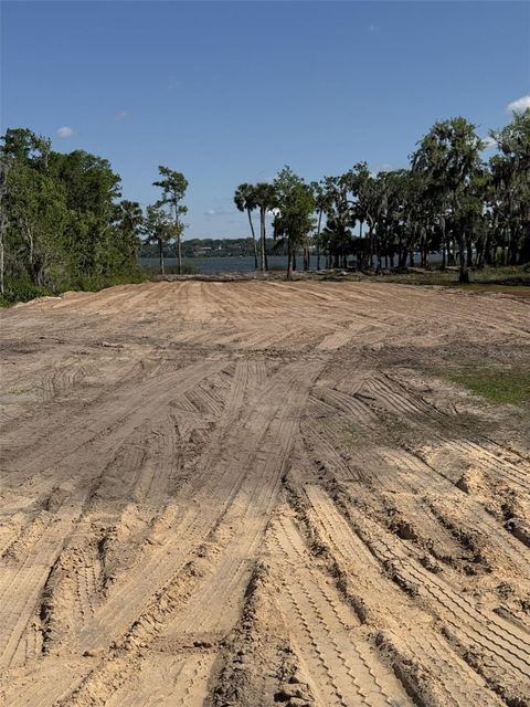 Photo of 4 Blue Heron Circle, Deer Island, FL 32778 (MLS # TB8371366)