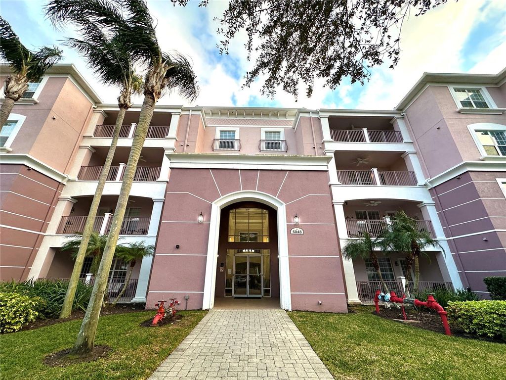 Photo of 5048 Shoreway Loop #108, Orlando, FL 32819 (MLS # O6379818)