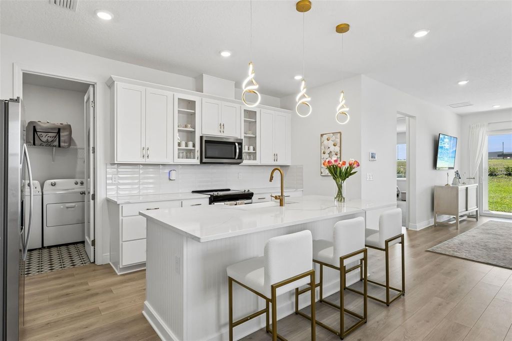 Photo of 1956 Sunshine Peak Drive, Minneola, FL 34715 (MLS # O6401942)