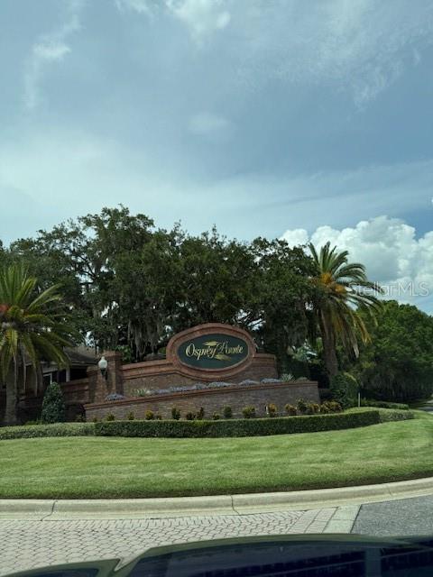 Gorgeous, oversized lot located in the gated Community of Osprey Pointe. This lot is located on a cul-de-sac and is directly across from the community nature walk. The community dock leads you out to Lake Minnehaha which is ideal for fishing, swimming or enjoy the breathtaking sunsets. Lake Minnehaha is part of the Clermont Chain of Lakes, which gives you access to 11 other lakes. There are several restaurants, bars and beaches along the Chain of Lakes that are accessible by water. Osprey Pointe is an established gated community with custom built single family homes and several million-dollar estates. The location is ideally situated in the middle of both coasts with convenient access to major roadways, shopping, restaurants, golf courses, hospitals, city parks, fitness trails, beaches, area attractions and Downtown Clermont. This is one of the last few lots available in this beautiful community, come make it your own.