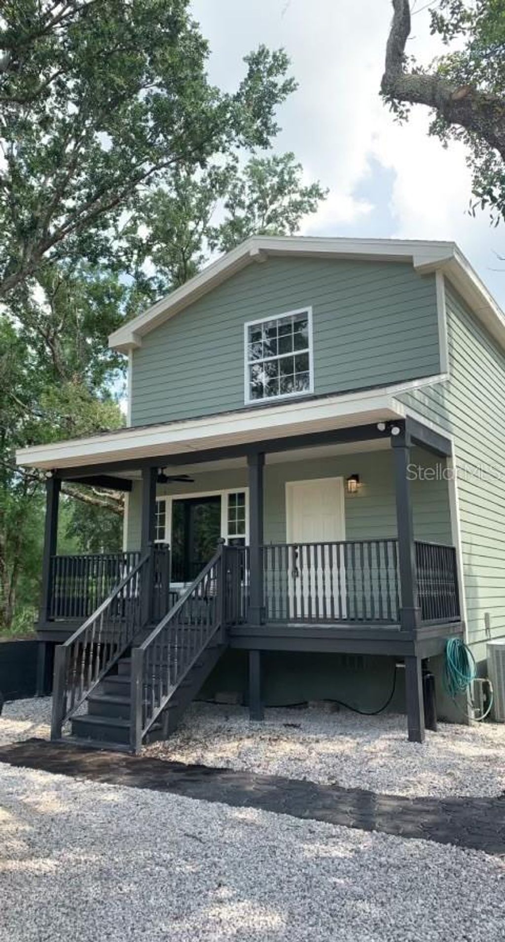 Photo of 7152 Sandy Lane, Wesley Chapel, FL 33544 (MLS # TB8389030)