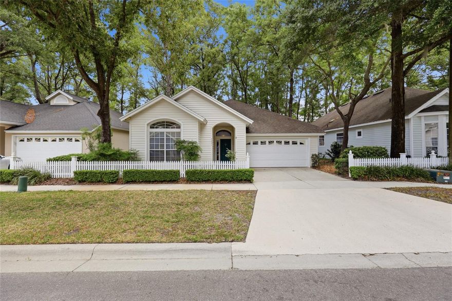 Beautiful home in quaint Chickasaw Way. On the golf course with a wooded common area between the home and the course. The home features a split plan, high ceilings, wood floors and very quiet living. Access the rear screened porch from the “hide-away” slider or the master bedroom. Zero lot line makes maintenance a breeze. The large sky light in the kitchen gives a great airy feel to the dining room. This home has a very cozy relaxed feel that lends itself to an easy life style. Check out the tour and give your Realtor a call.