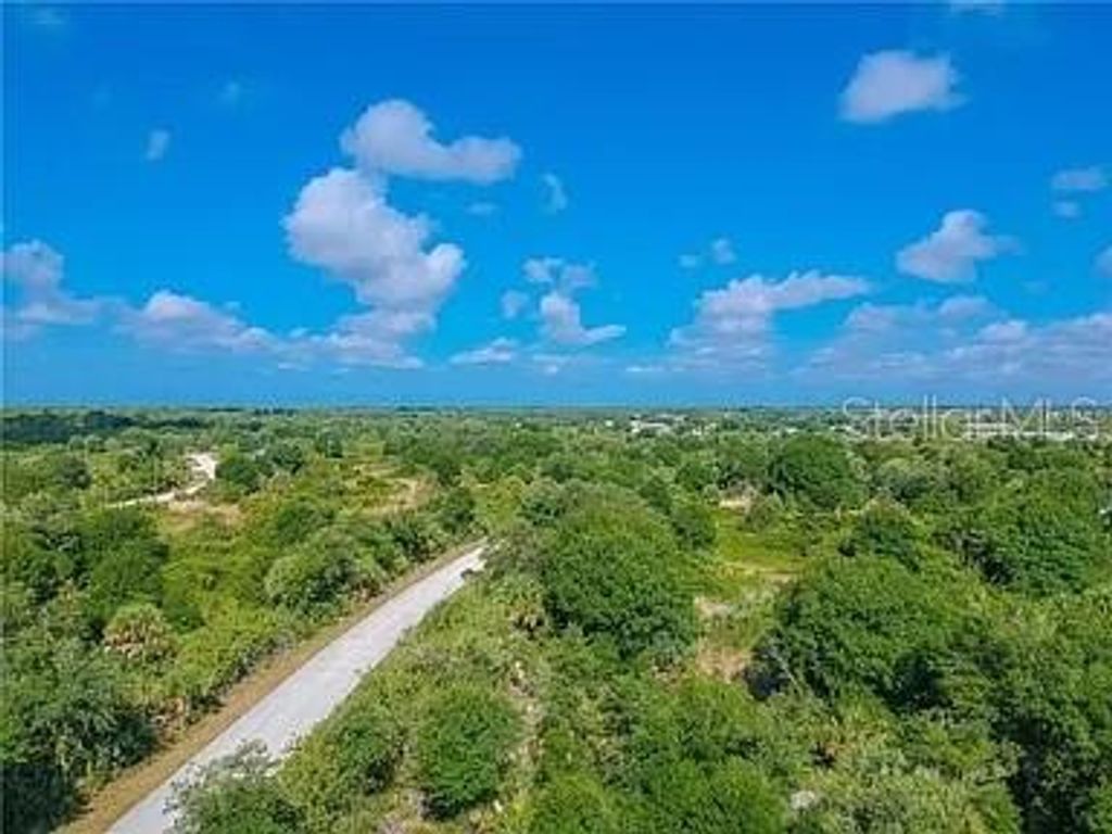 Photo of 7560 Riverton Circle, Port Charlotte, FL 33981 (MLS # O6343029)
