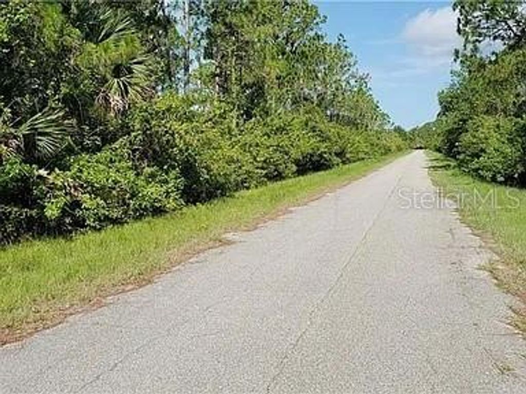 Photo of 7560 Riverton Circle, Port Charlotte, FL 33981 (MLS # O6343029)