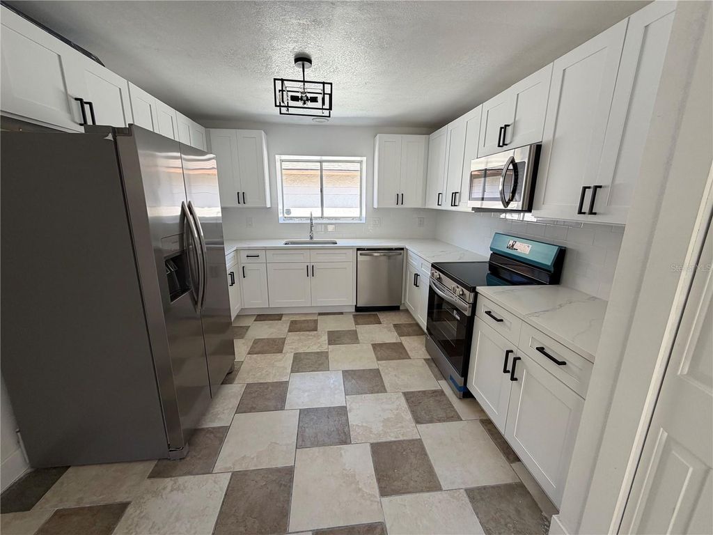 Photo of 7031 Drury Street, Tampa, FL 33635 (MLS # TB8473782)