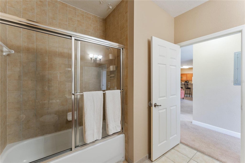 Photo of 3174 Feltrim Place #201, Kissimmee, FL 34747 (MLS # O6446939)