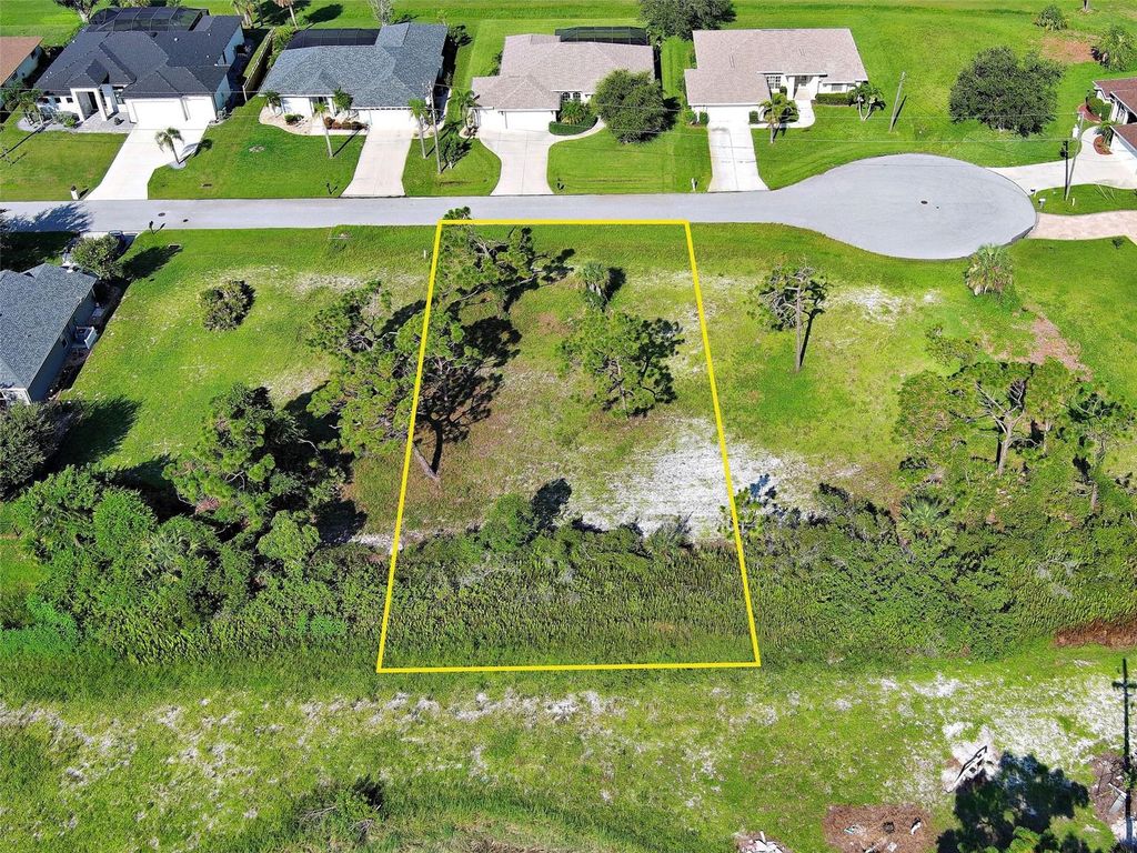 Photo of 15 Clubhouse Place, Rotonda West, FL 33947 (MLS # D6145588)