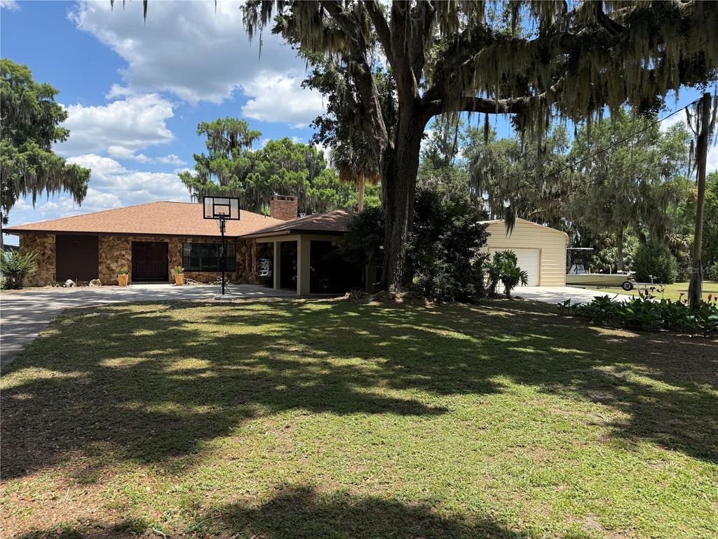 Photo of 4232 County Road 400, Lake Panasoffkee, FL 33538 (MLS # G5112404)