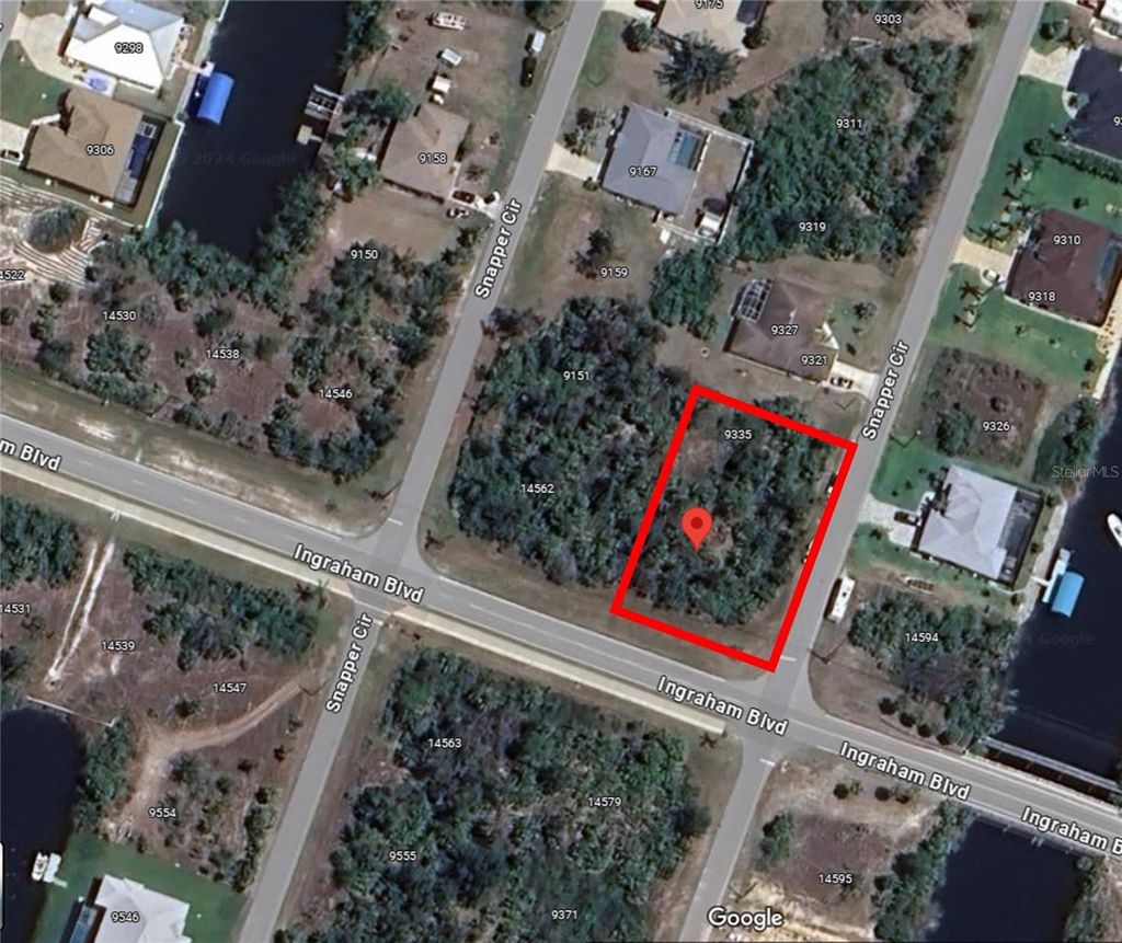 Photo of 14578 Ingraham Boulevard, Port Charlotte, FL 33981 (MLS # O6190195)