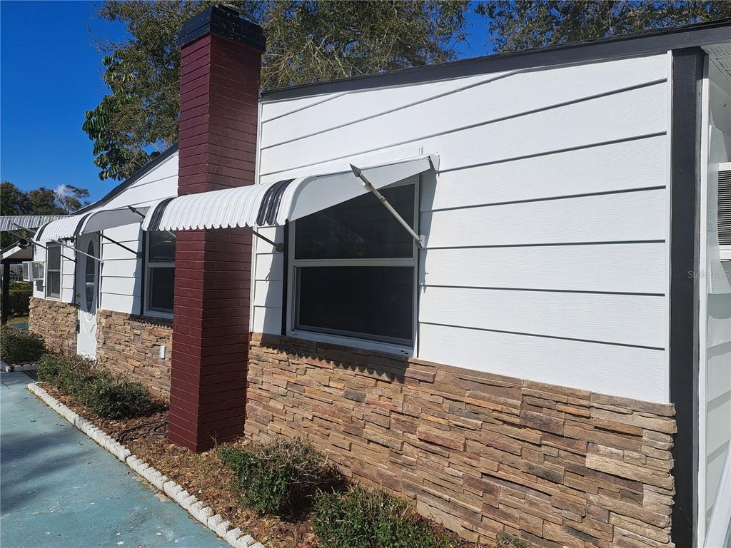 Photo of 1040 65th Street S, South Pasadena, FL 33707 (MLS # TB8422462)