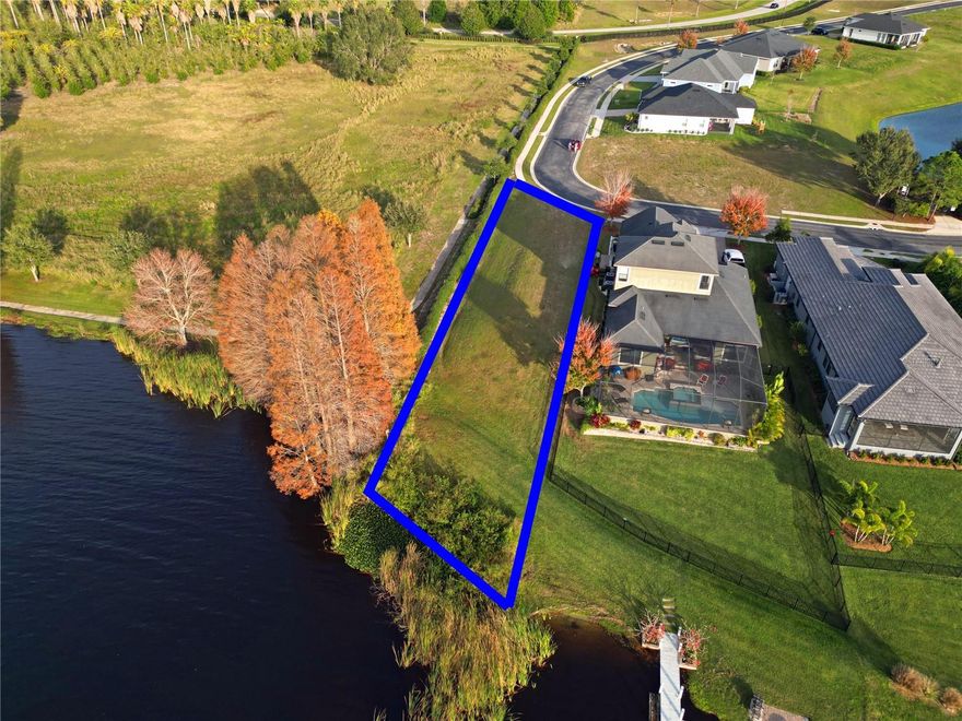 INCREDIBLE PRICE UPDATE For A Waterfront Deal on the Lake Van side of Water Ridge ! Discover the boundless joy of crafting your dream home in the vibrant enclave of Water Ridge in Auburndale. Nestled on the picturesque shores of Lake Van in Auburndale, this exclusive gated community beckons with an exhilarating blend of luxury living and breathtaking scenic vistas. Revel in the lively atmosphere as Water Ridge unveils a splendid clubhouse complete with private pools, a state-of-the-art fitness center, and tennis and pickleball courts. Venture into aquatic adventures with 2 private boat ramps granting access to the serene waters of Lake Van and Lake Alfred. Enjoy a seamless commute to the neighboring communities of Lake Alfred, Davenport, Winter Haven, and Lakeland, thanks to the community's strategic location including only a few miles from a Brand New Publix up on 559!  Embrace convenient connectivity via the I-4 corridor, effortlessly linking you to the enchanting realms of Orlando, Tampa, and the magical world of Disney.

Photos show Fully approved front and rear elevations design and engineered set of plans that are available for additional purchase.