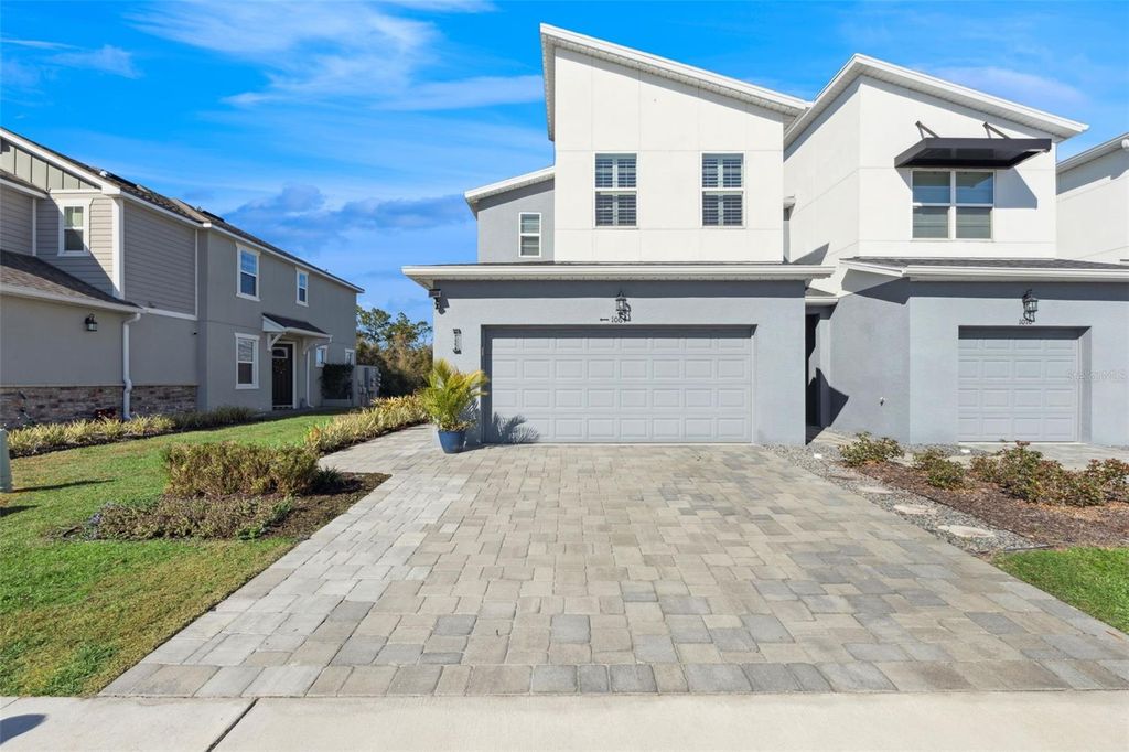 Photo of 1064 Spring Palms Loop, Orlando, FL 32828 (MLS # O6377247)