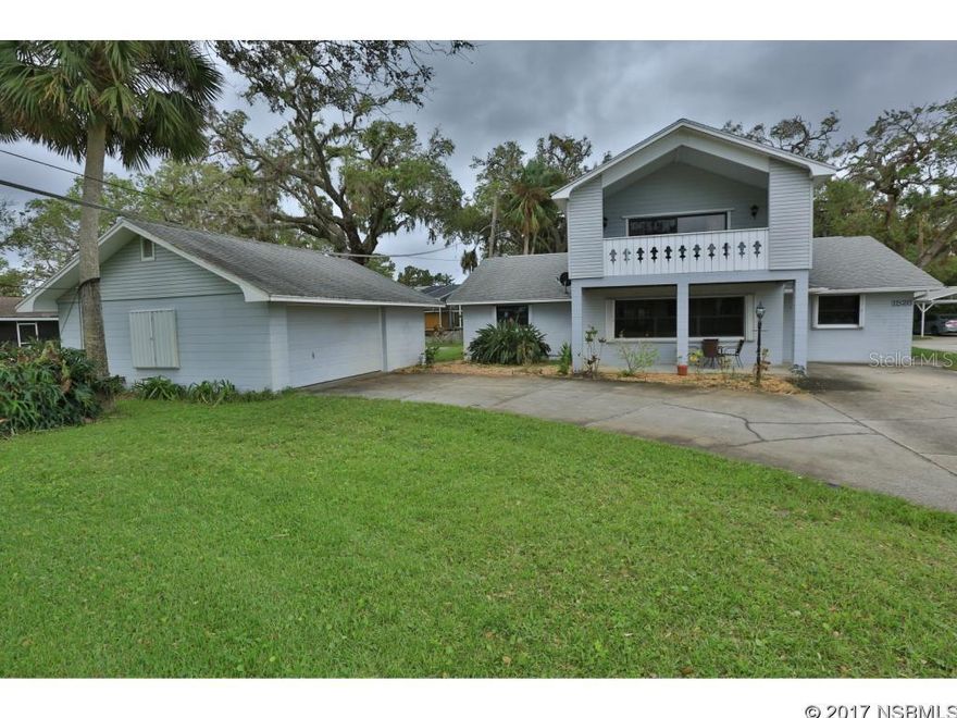 Waterview home on prestigious Riverside Drive was rebuilt in 1992.  A breezy balcony for you to enjoy your morning coffee.  Palm trees and a few mature oaks are on this lush property.  Three bedrooms on the first floor, large master suite upstairs.  Spacious Florida Room with high vaulted ceilings with windows on three sides giving cool breezes.  A separate entrance for the third bedroom and bath downstairs allow for multi generational use.  The detached 3 car garage has a pull down staircase and room for storage.  Public boat ramps and parks are close by. ;Water: City