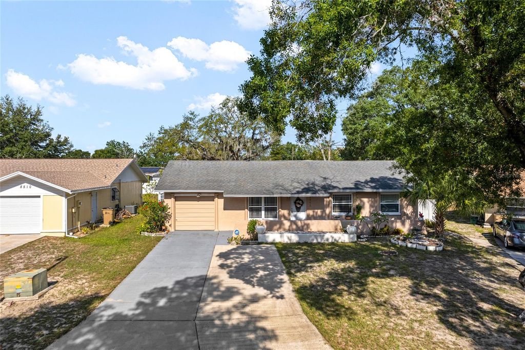 Photo of 8512 CALADESI ISLAND DRIVE, TEMPLE TERRACE, FL 33637 (MLS # T3446903)