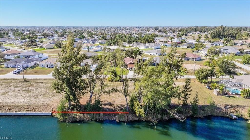 Photo of 1235 NW 20th Place, Cape Coral, FL 33993 (MLS # D6146005)